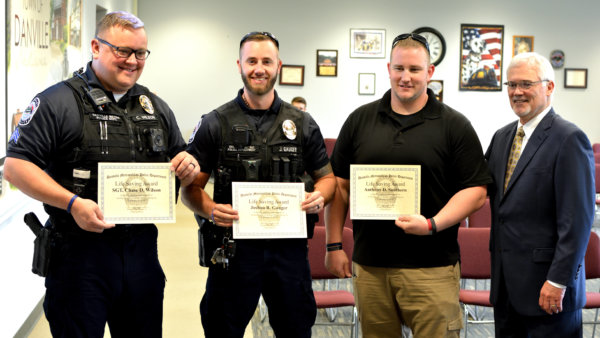 DMPD trio awarded for entering burning house to save trapped residents