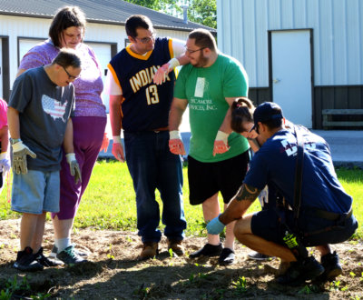 Sycamore sows garden with local support