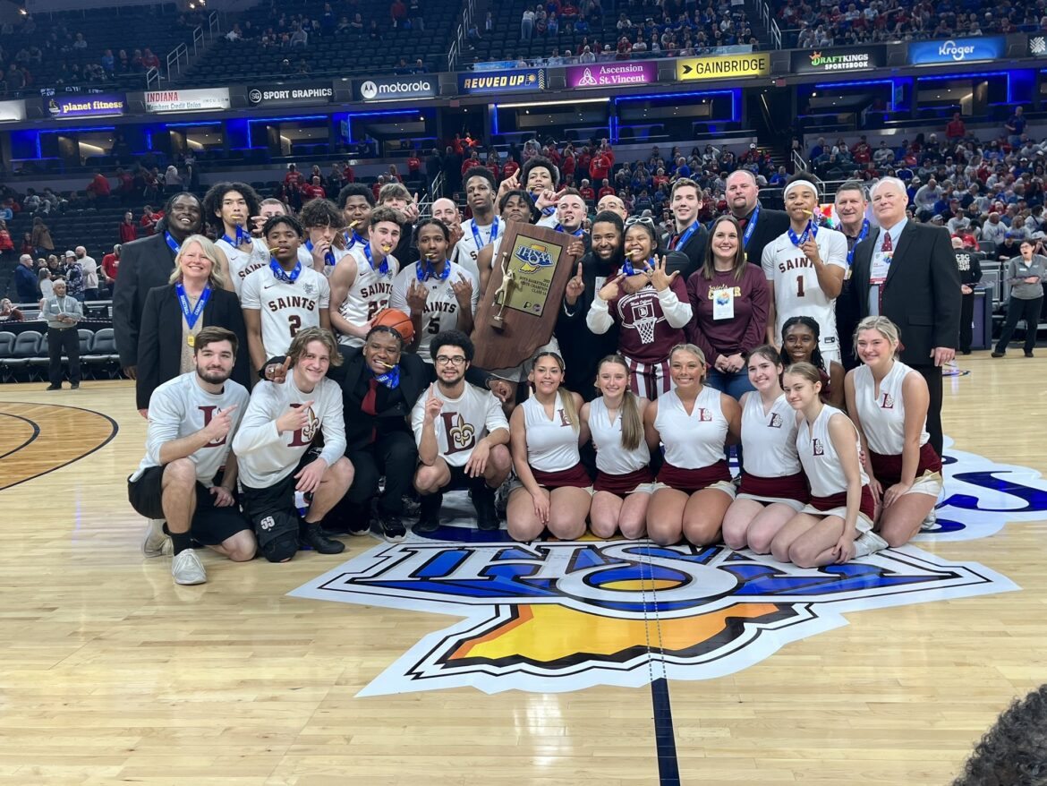 Saints march to first state basketball title